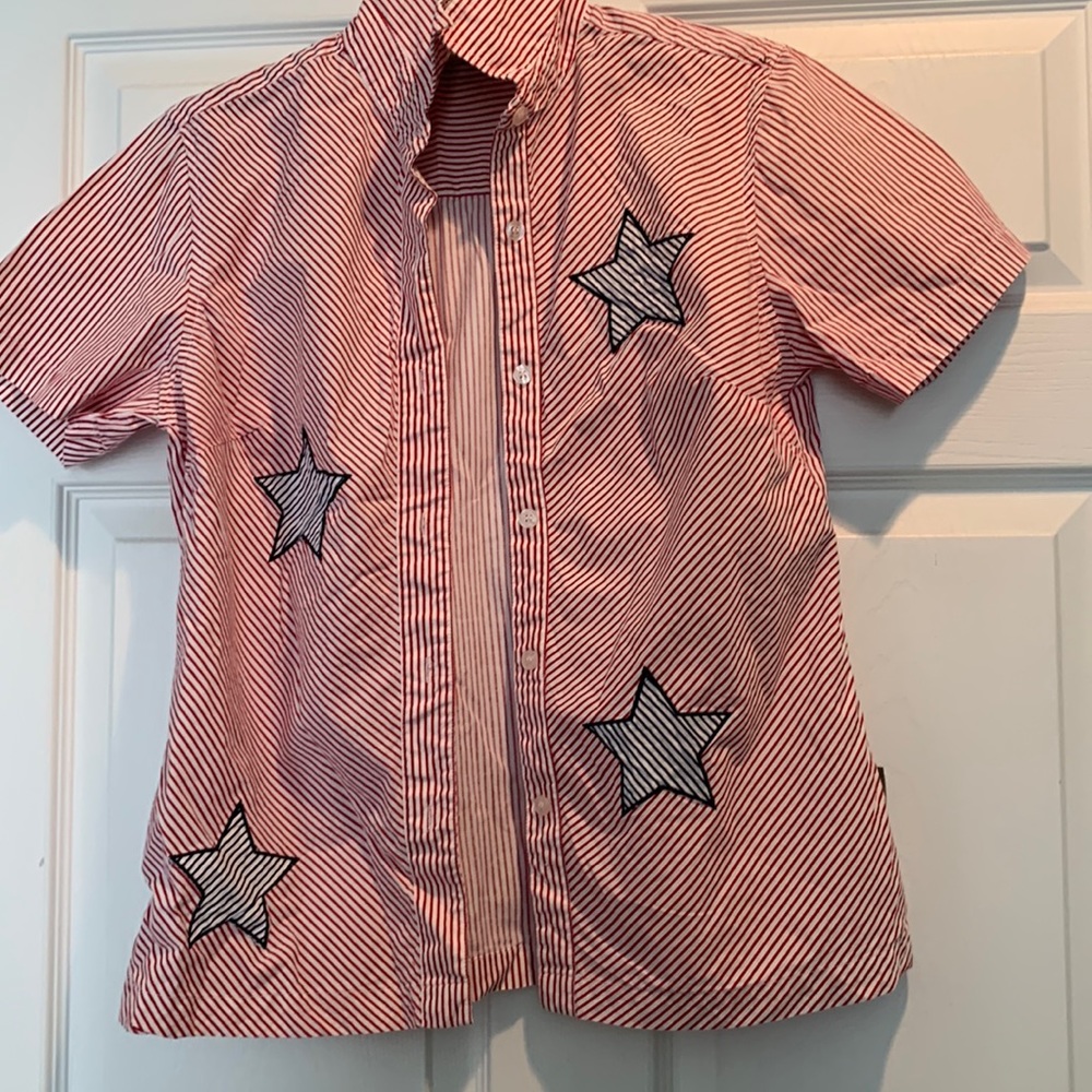 Red striped botton down shirt with 4 blue striped stars, smoke & pet free